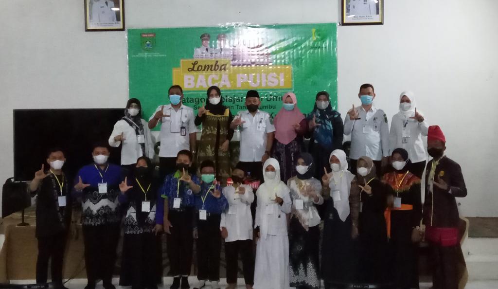 Dispersip Tanbu Dorong Minat Baca Anak Muda Melalui Lomba Baca Puisi