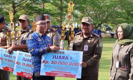 Pemkab Tanbu Terima Penghargaan atas Prestasi Lomba Pos Satlinmas dan Pos Kamling