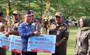 Pemkab Tanbu Terima Penghargaan atas Prestasi Lomba Pos Satlinmas dan Pos Kamling
