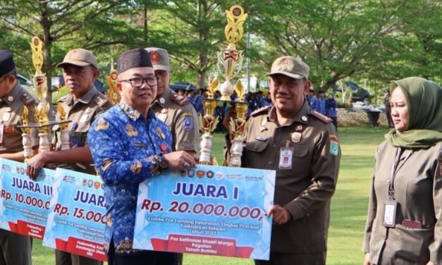 Pemkab Tanbu Terima Penghargaan Atas Prestasi Juara Pos Satlinmas dan Pos Kamling